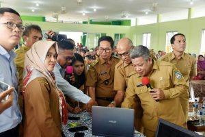 Transaksi Nontunai Lindungi Uang Masyarakat Desa